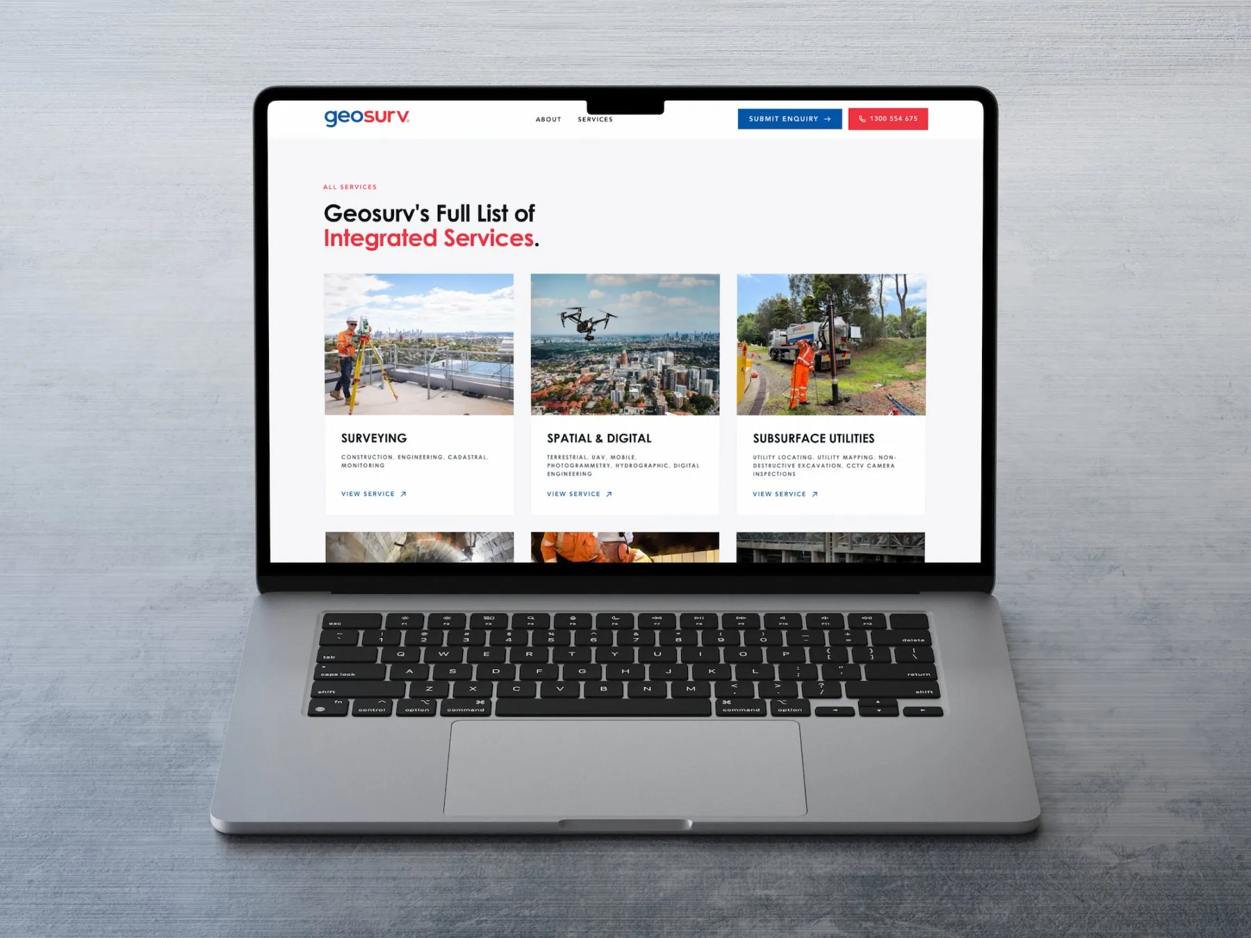 GeoSurv website on a laptop